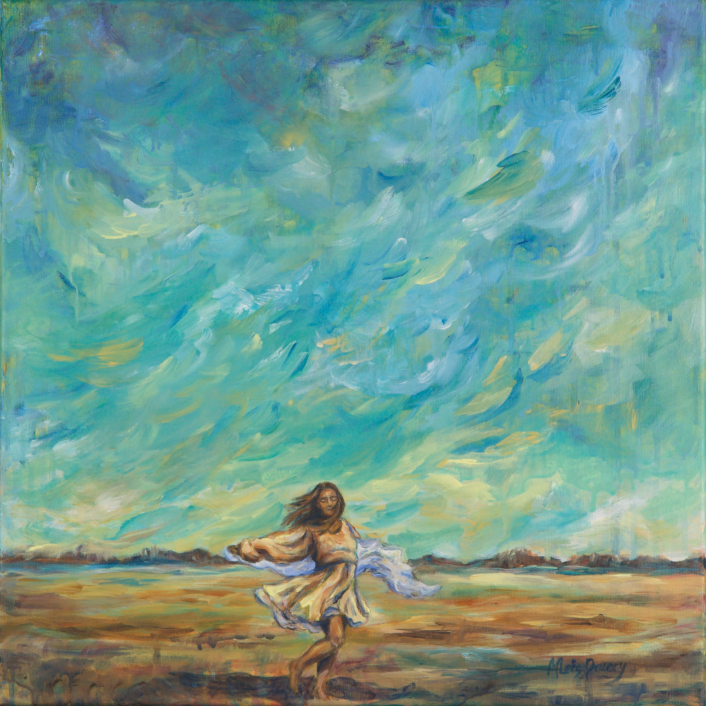 A woman dancing in a field